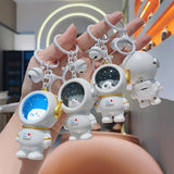 Glowing Astronaut Charm – Sød & lysende – Astronaut-taskehænger